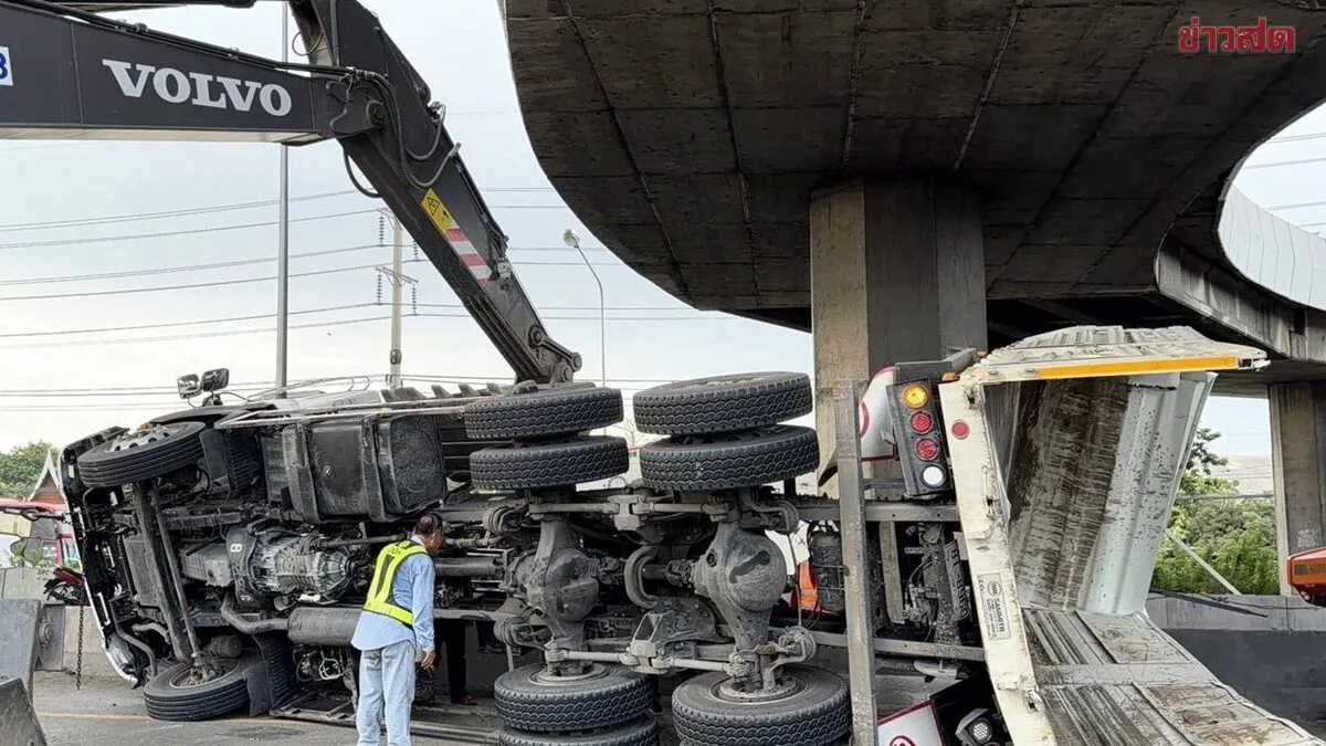 Dump Truck Crashes Into Overpass, Injuring Driver And Child